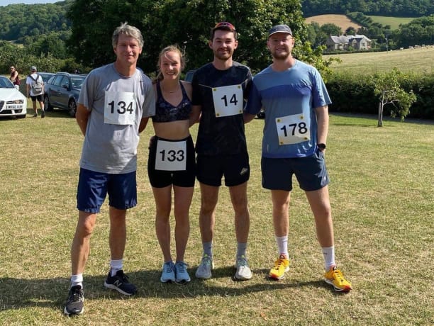 Will stands on the far right of the picture with a group of friends after running the Piddle Wood 10k. 