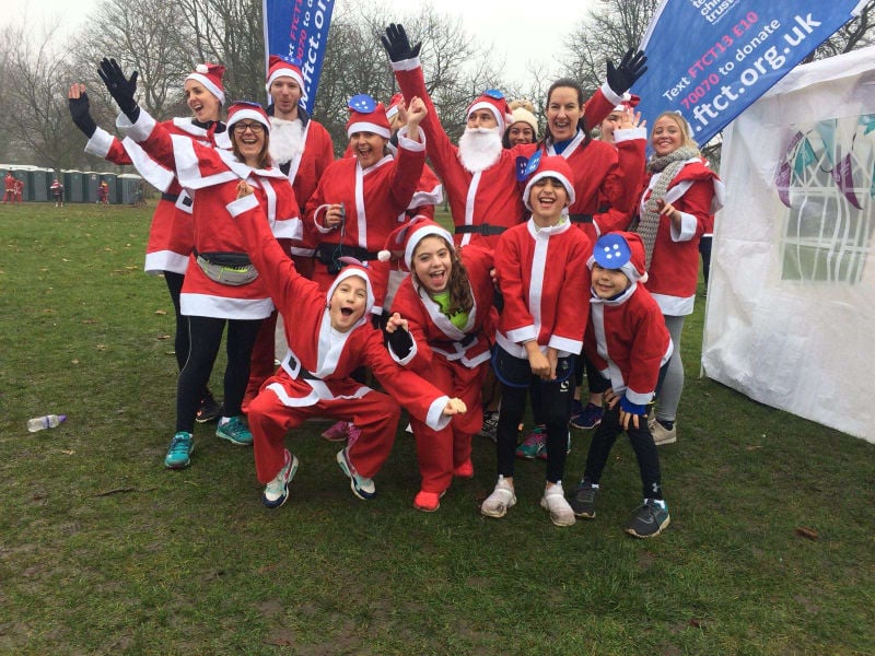 Team picture of Santa runners. 